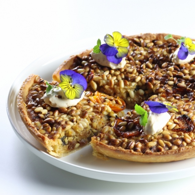 Pine nut tart with sweet-and-sour tomatoes and Tikka masala